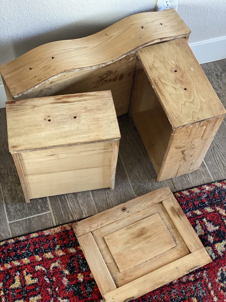 A picture of drawers that have been stripped of their varnish to reveal the raw and natural wood underneath.