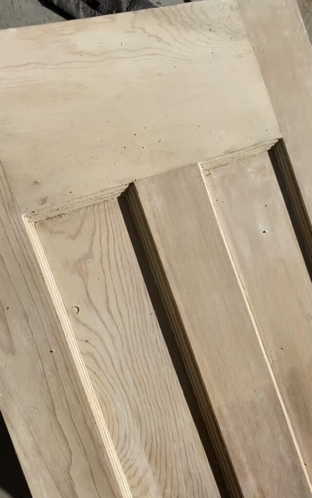 A picture of a stripped door showing the beautiful wood grain